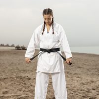 full shot woman martial arts outfit